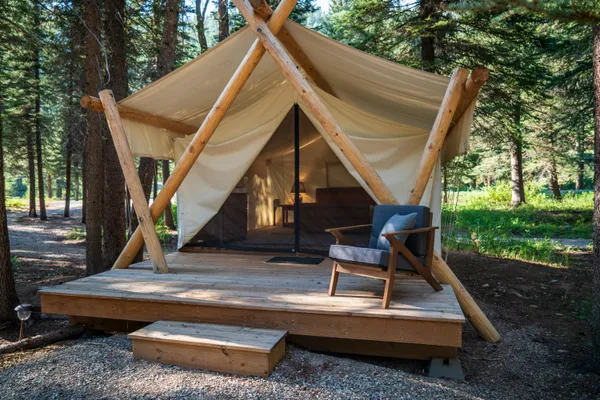 a view of house with pool porch and furniture
