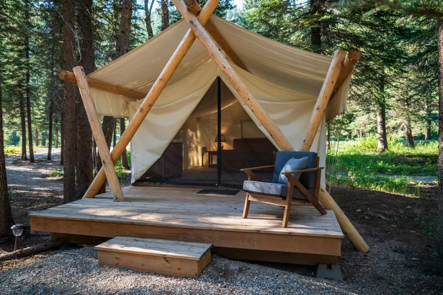 a view of house with pool porch and furniture