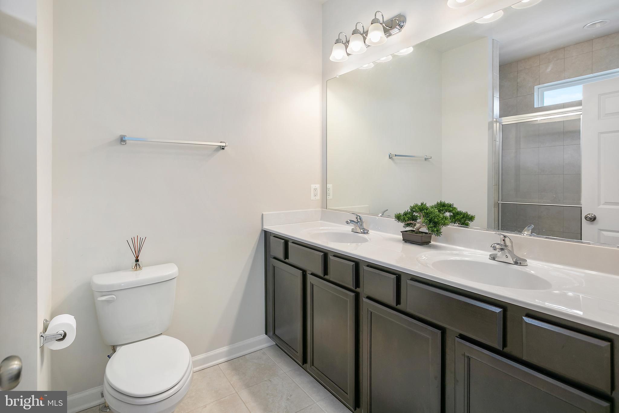 9174 Snowden Ashford Road Lorton, VA 22079 - Photo 16 of 38 Large Primary ensuite bathroom w/ dual sinks