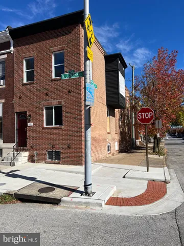 a building on the side of a street