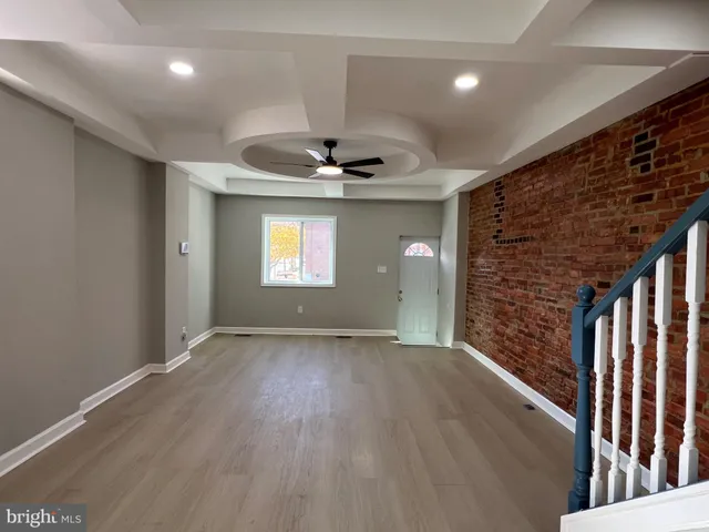 a view of an empty room and window