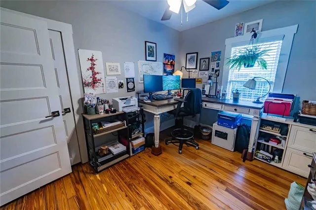 a room with furniture and a wooden floor