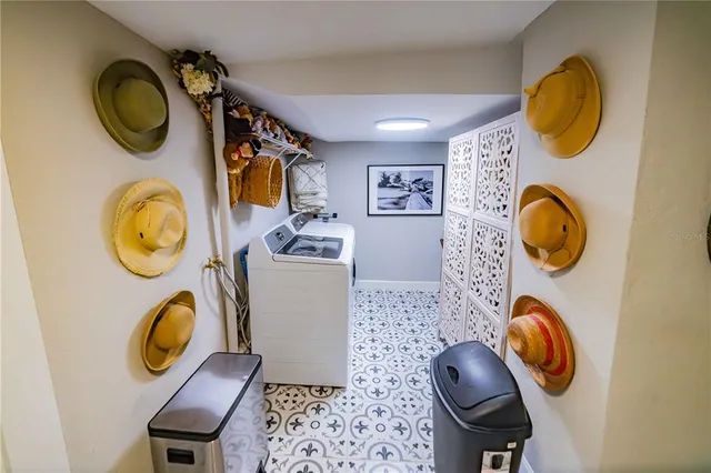 a view of entryway with wooden wall and mirror