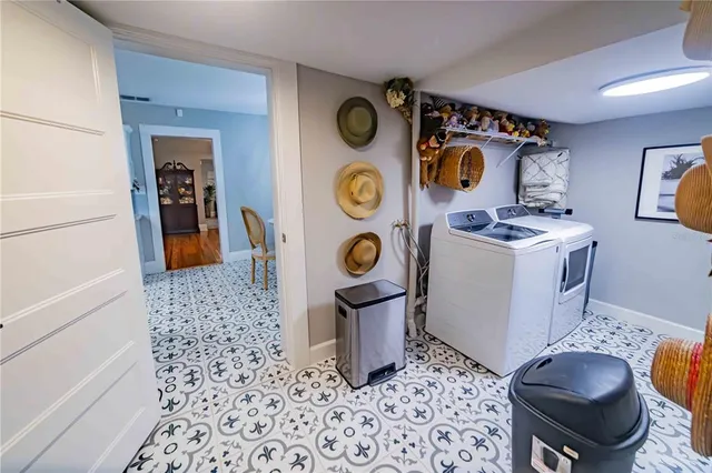 a white stove top oven sitting inside of a kitchen