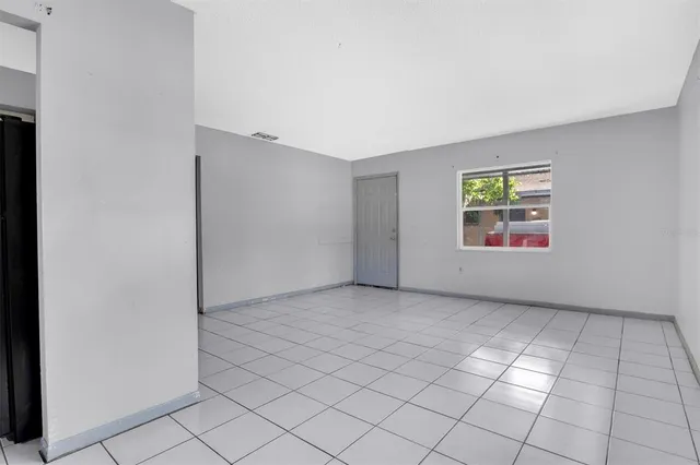 a kitchen with a sink stove and refrigerator