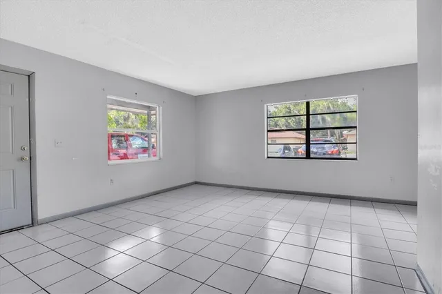 an empty room with windows