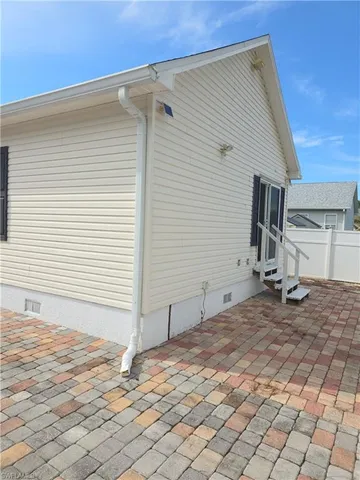 a view of a backyard of the house
