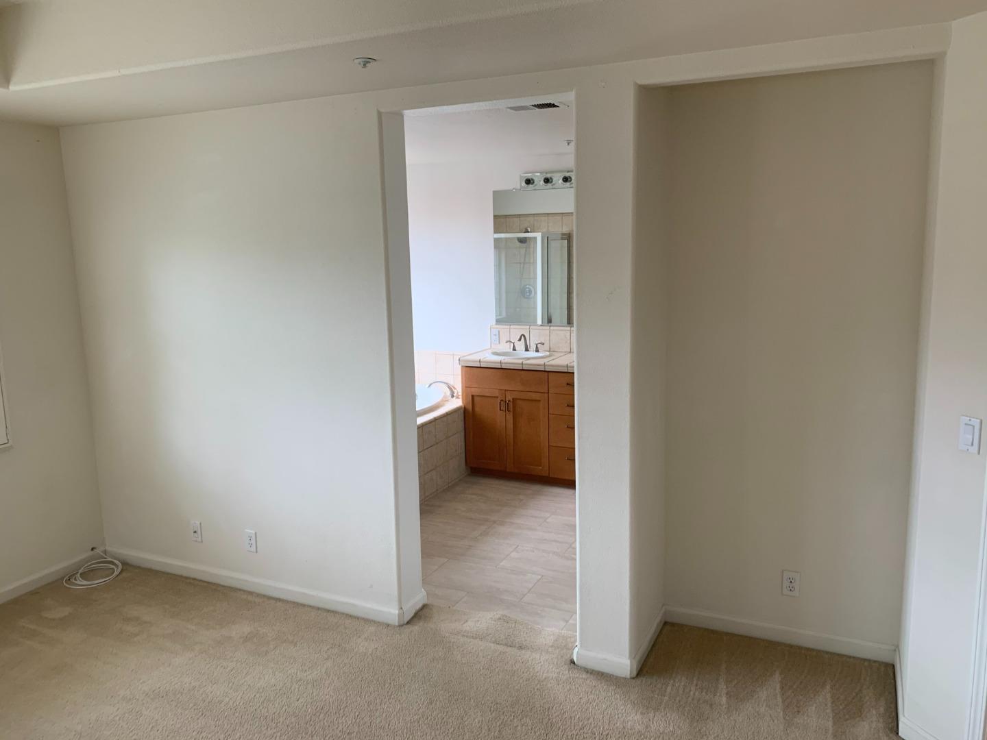1007 Fitzgerald Street Salinas, CA 93906 - Photo 14 of 22 a view of a room with a washer and dryer