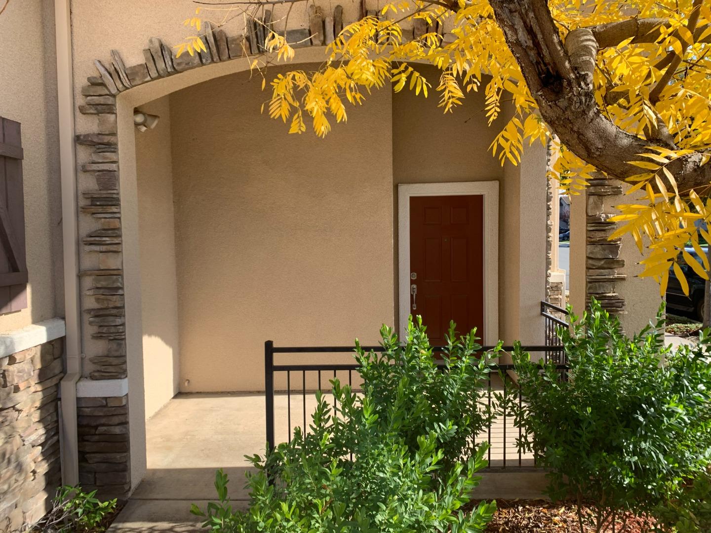1007 Fitzgerald Street Salinas, CA 93906 - Photo 3 of 22 a view of a house with a small yard plants and a large tree
