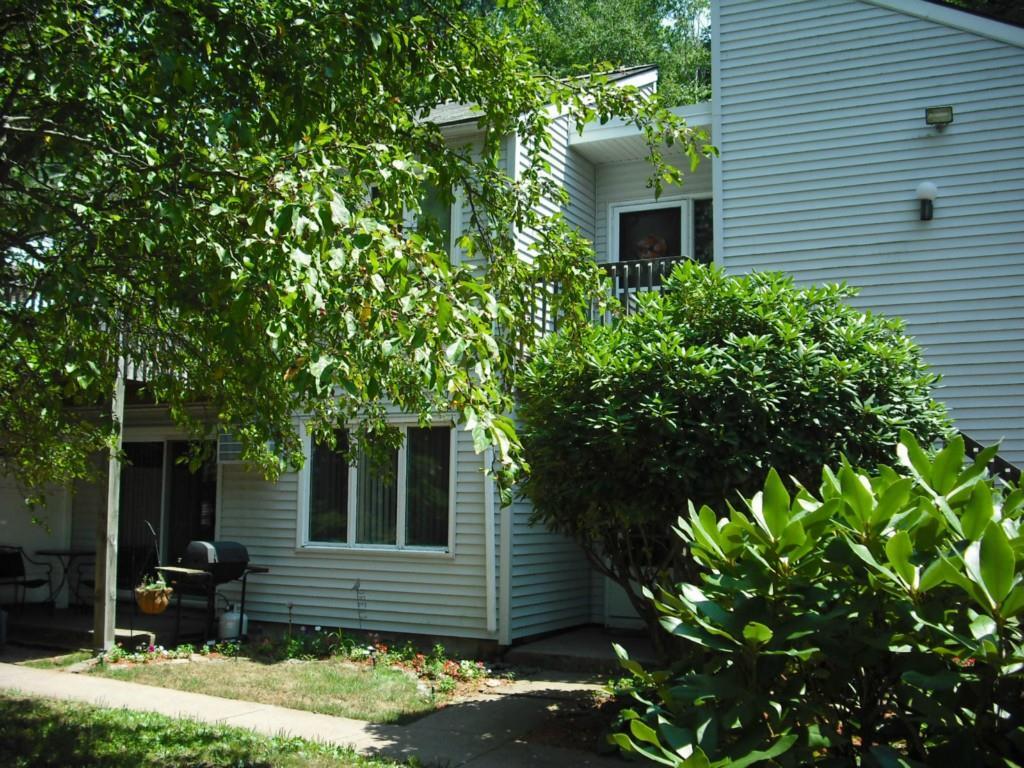 85 Old Town Road, Unit 33 Vernon, CT 06066 - Photo 1 of 1 a front view of a house with garden