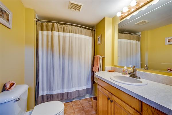 4 Old Providence Road Sutton, MA 01590 - Photo 14 of 30 a bathroom with a sink a toilet and shower curtain