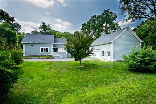 4 Old Providence Road Sutton, MA 01590 - Photo 27 of 30 a front view of a house with garden