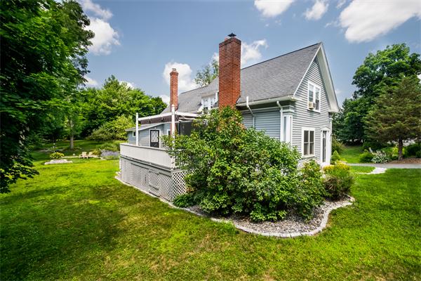 4 Old Providence Road Sutton, MA 01590 - Photo 3 of 30 a front view of a house with garden