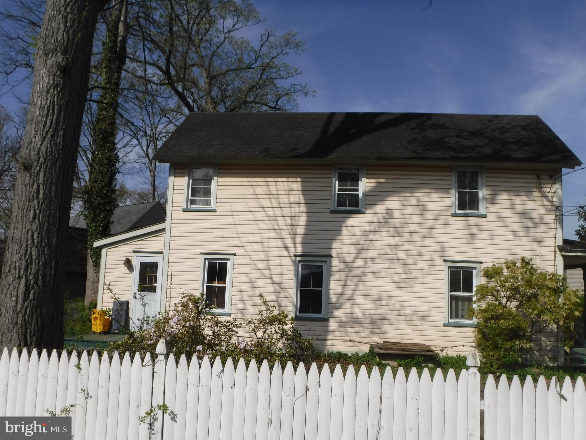 125 12th Avenue Pitman, NJ 08071 - Photo 2 of 2 a front view of a house with a garden
