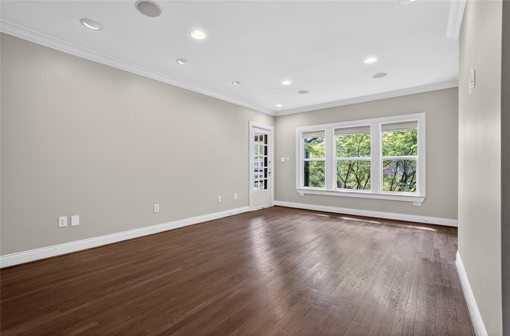 4009 Prescott Avenue Dallas, TX 75219 - Photo 24 of 39 Upstairs living area/library/media room with access to covered balcony