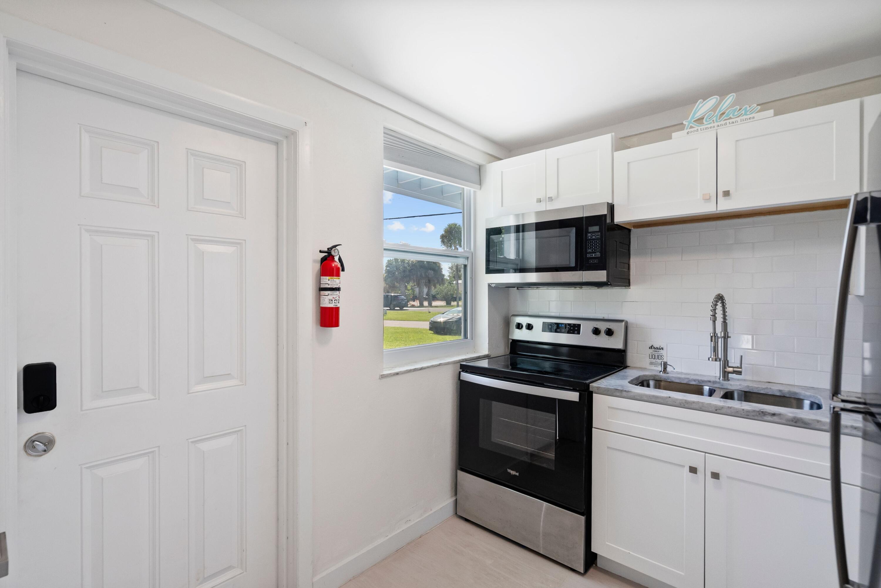 670 Hernando Street, Unit E Fort Pierce, FL 34949 - Photo 5 of 23 Kitchen 2