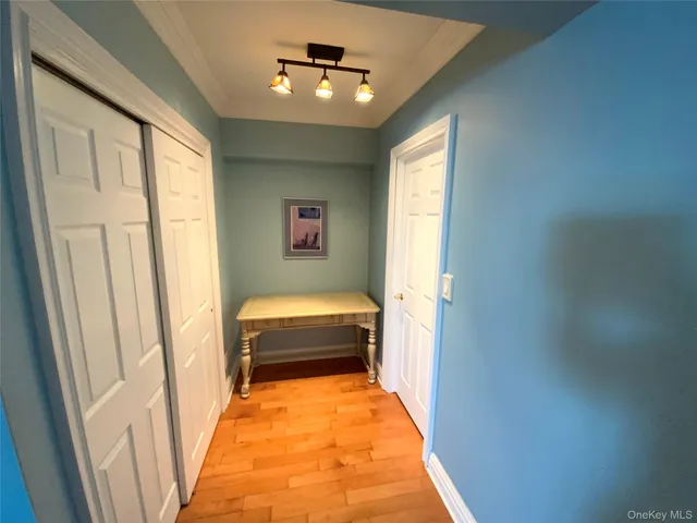 a bathroom with a tub and a window