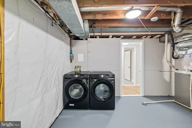 a view of a room with wooden walls