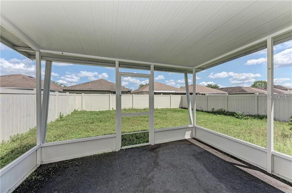 10267 Newminster Loop Ruskin, FL 33573 - Photo 33 of 38 a view of backyard with green space