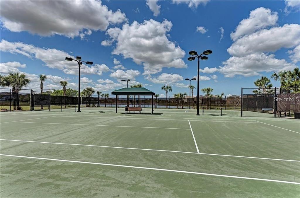 10267 Newminster Loop Ruskin, FL 33573 - Photo 35 of 38 a view of a tennis court