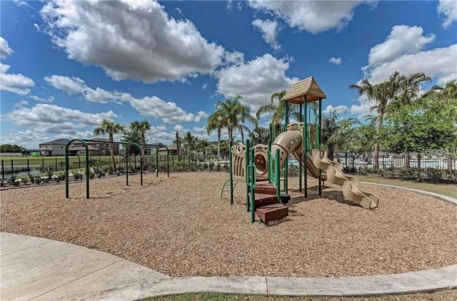 a park with lots of swings slides