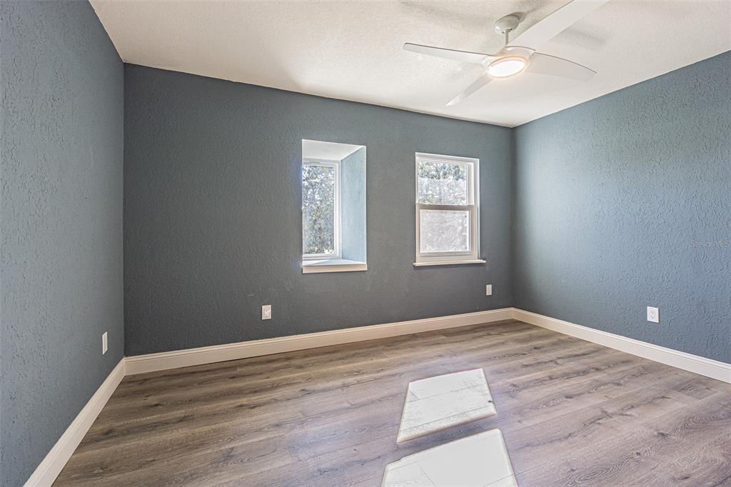 6370 Conniewood Square New Port Richey, FL 34653 - Photo 17 of 27 a view of an empty room with a window