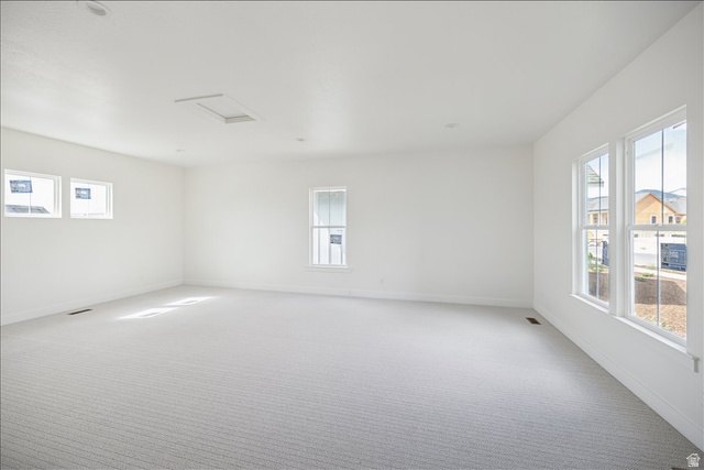 7189 South Sage Road, Unit 214 West Jordan, UT 84081 - Photo 28 of 29 Spacious room featuring light-toned carpeting and white walls