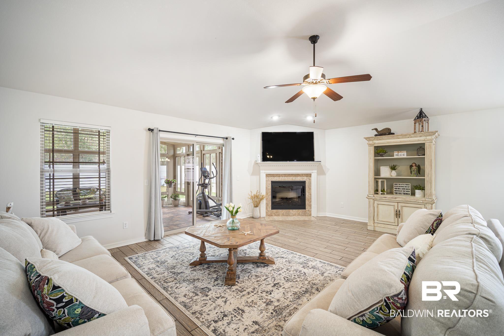 145 Meadow Run Loop West Foley, AL 36535 - Photo 5 of 32 Living Room to Sunroom
