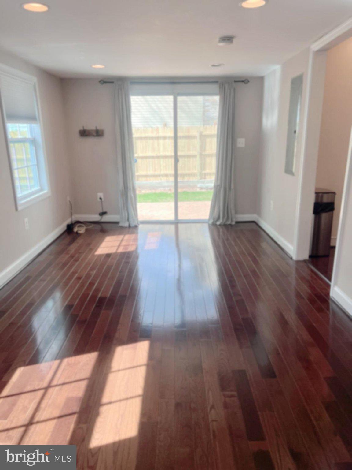 2006 Griffith Road Falls Church, VA 22043 - Photo 6 of 17 an empty room with wooden floor and windows