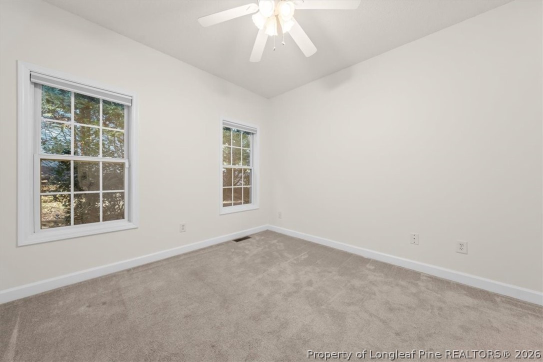 60 Spring Lake Drive Pinehurst, NC 28374 - Photo 21 of 42 an empty room with a window