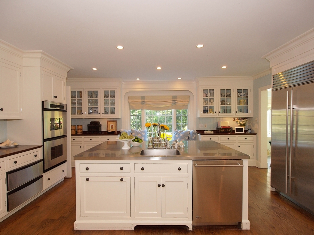 230 Rosebrook Road New Canaan, CT 06840 - Photo 12 of 25 a kitchen with refrigerator and window