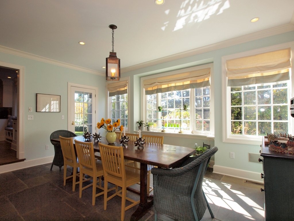 230 Rosebrook Road New Canaan, CT 06840 - Photo 15 of 25 a dining room with furniture window wooden floor