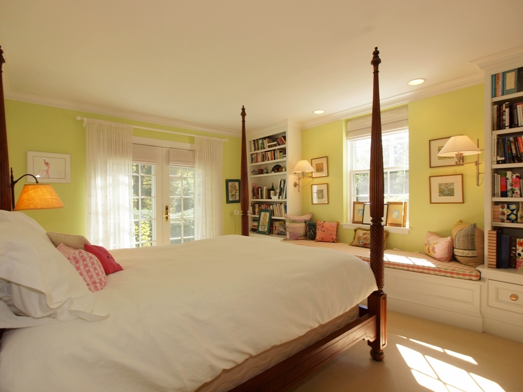 230 Rosebrook Road New Canaan, CT 06840 - Photo 23 of 25 a bedroom with a large bed and a chandelier
