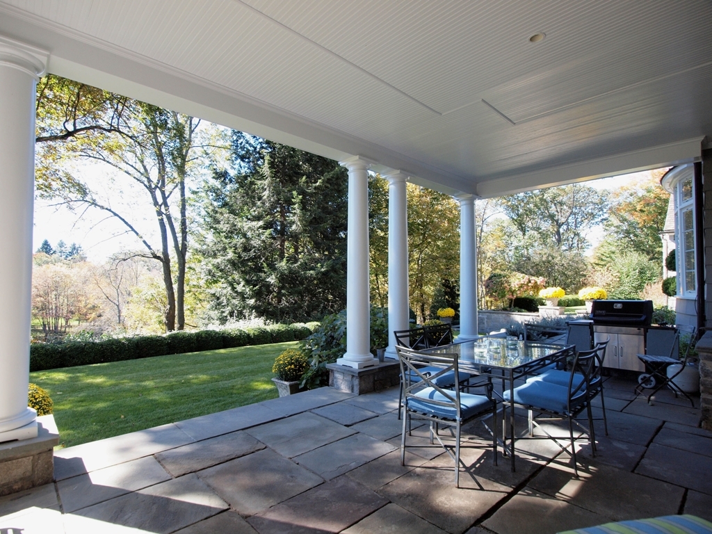 230 Rosebrook Road New Canaan, CT 06840 - Photo 3 of 25 a living room filled with furniture and garden
