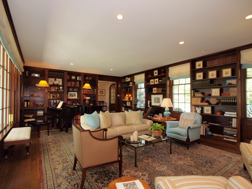 230 Rosebrook Road New Canaan, CT 06840 - Photo 8 of 25 a living room with furniture and a floor to ceiling window
