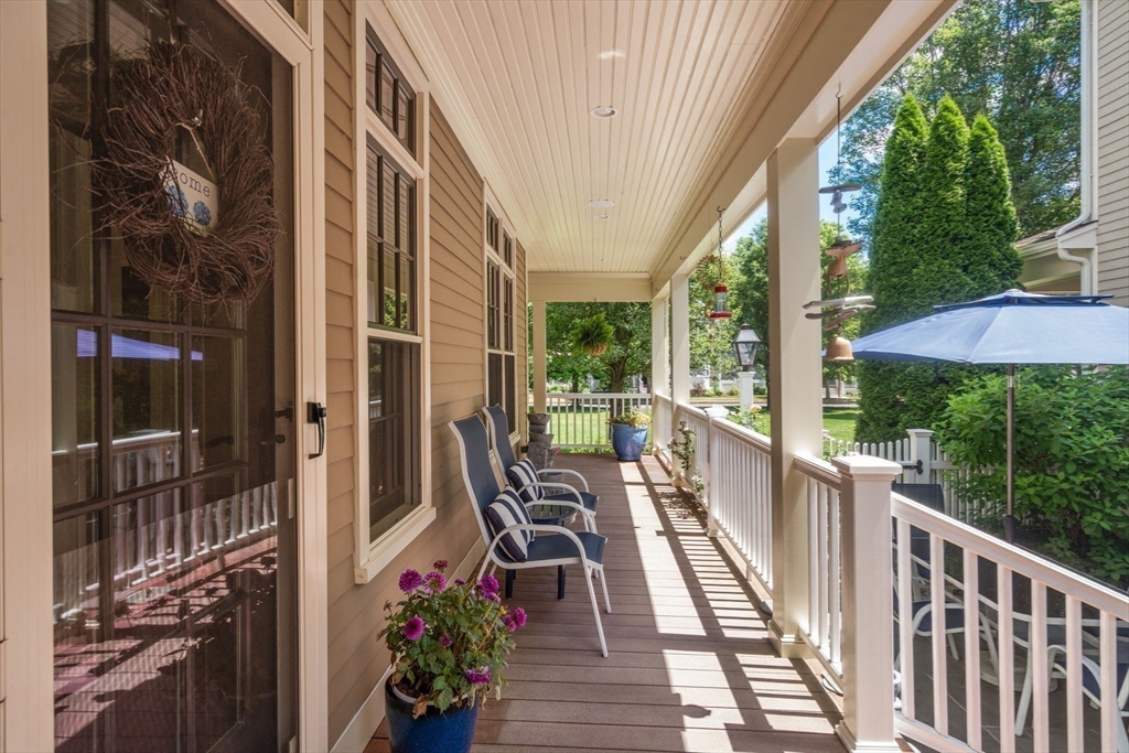 29 Maple Lane, Unit 29 Medfield, MA 02052 - Photo 31 of 42 a view of a balcony with chairs