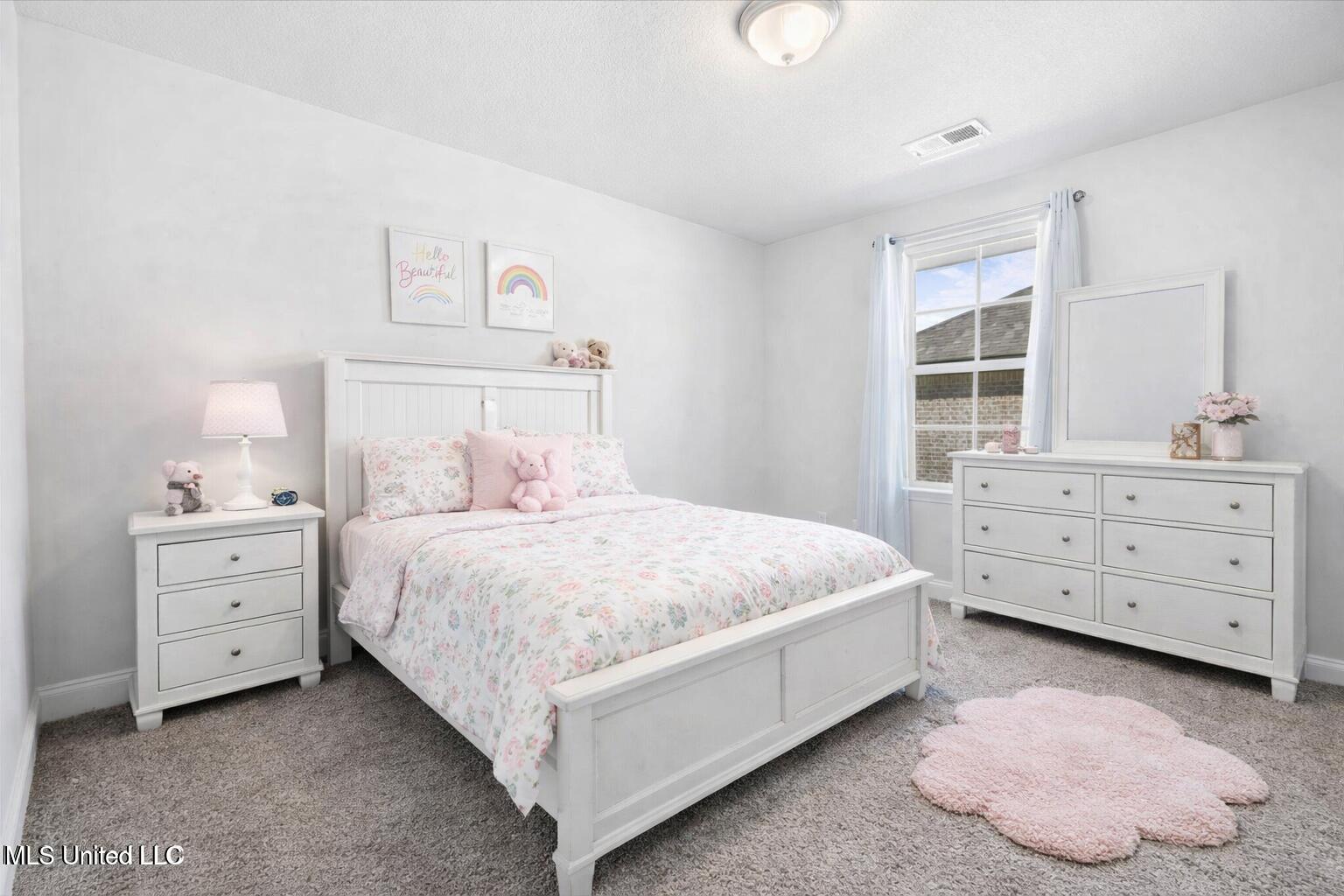 2520 Rutherford Drive Southaven, MS 38672 - Photo 17 of 26 Bright and cozy pink-themed bedroom