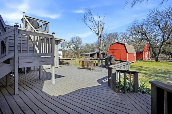 a view of roof deck with patio