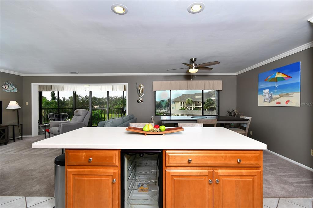 1590 Islamorada Boulevard, Unit 84C Punta Gorda, FL 33955 - Photo 15 of 38 a view of a dining room with a table and chairs