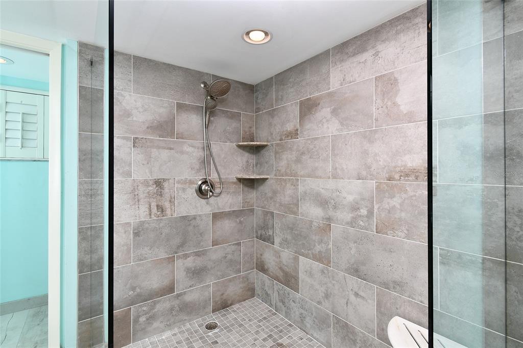 1590 Islamorada Boulevard, Unit 84C Punta Gorda, FL 33955 - Photo 26 of 38 a bathroom with a shower