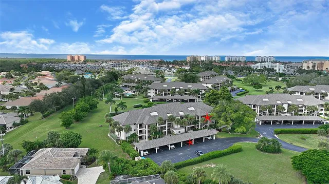 an aerial view of a house with a garden