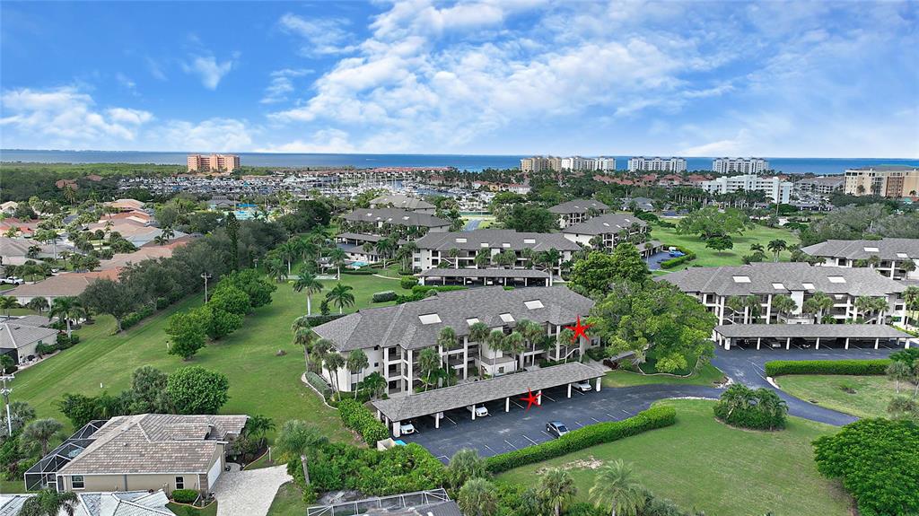 1590 Islamorada Boulevard, Unit 84C Punta Gorda, FL 33955 - Photo 4 of 38 an aerial view of a house with a garden