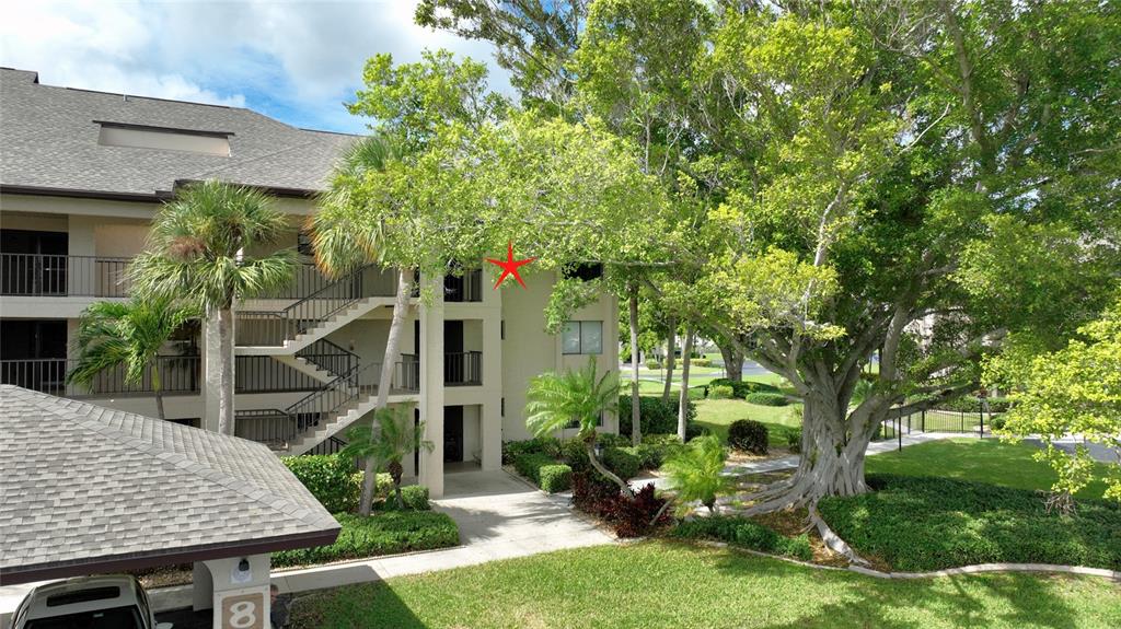 1590 Islamorada Boulevard, Unit 84C Punta Gorda, FL 33955 - Photo 6 of 38 a view of backyard with plants and outdoor seating