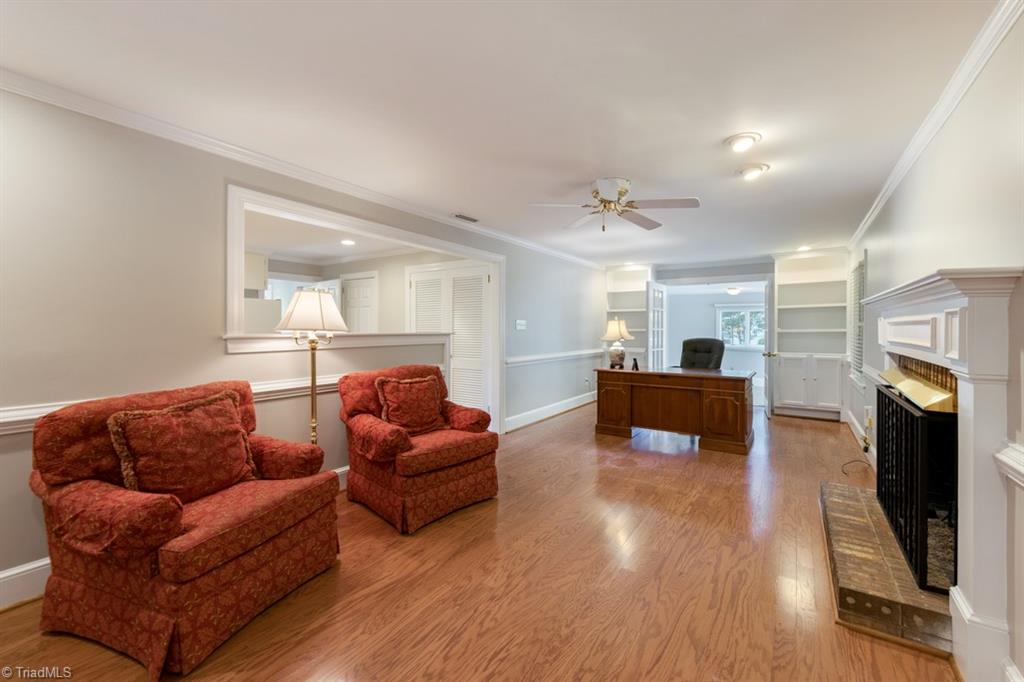 800 Archer Road Winston-Salem, NC 27106 - Photo 15 of 32 Oversized den has built-in bookcases for a home office.