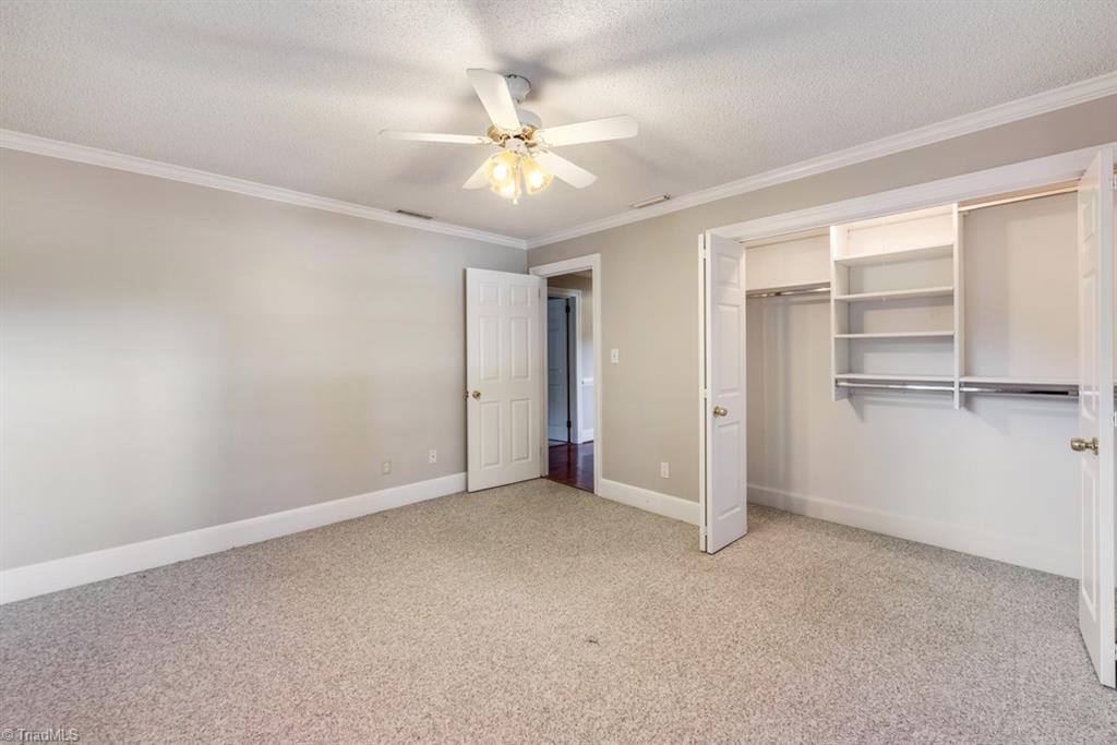 800 Archer Road Winston-Salem, NC 27106 - Photo 22 of 32 Other view of second bedroom showing large closet space.