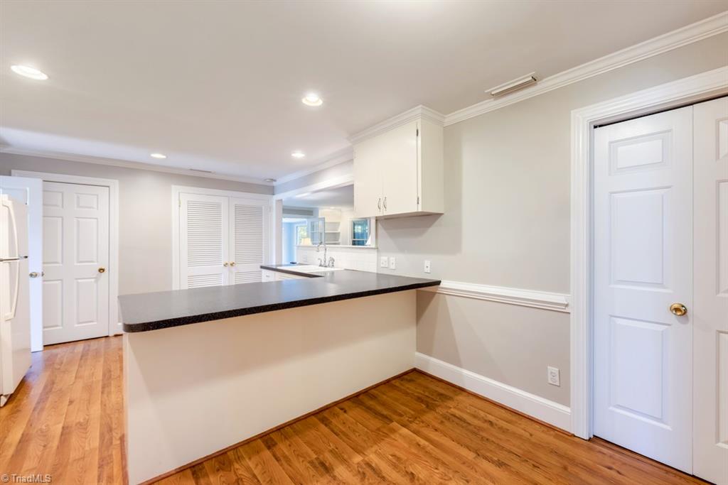 800 Archer Road Winston-Salem, NC 27106 - Photo 10 of 32 Breakfast room with pantry and eating bar.