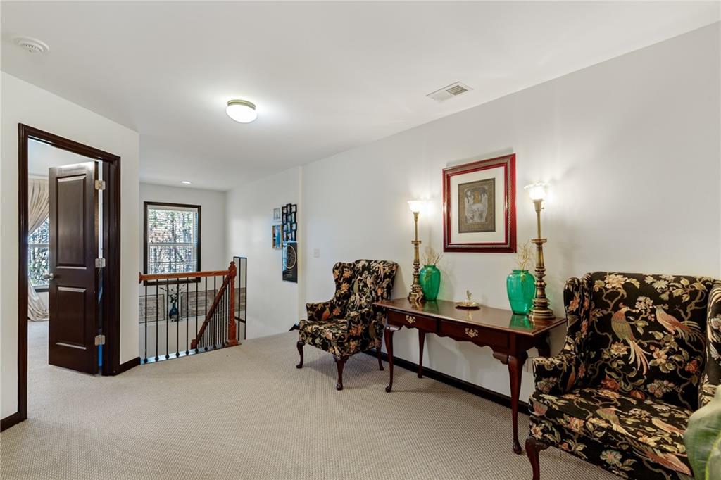 4430 Cedar Bridge Walk Suwanee, GA 30024 - Photo 17 of 29 a living room with furniture and a window