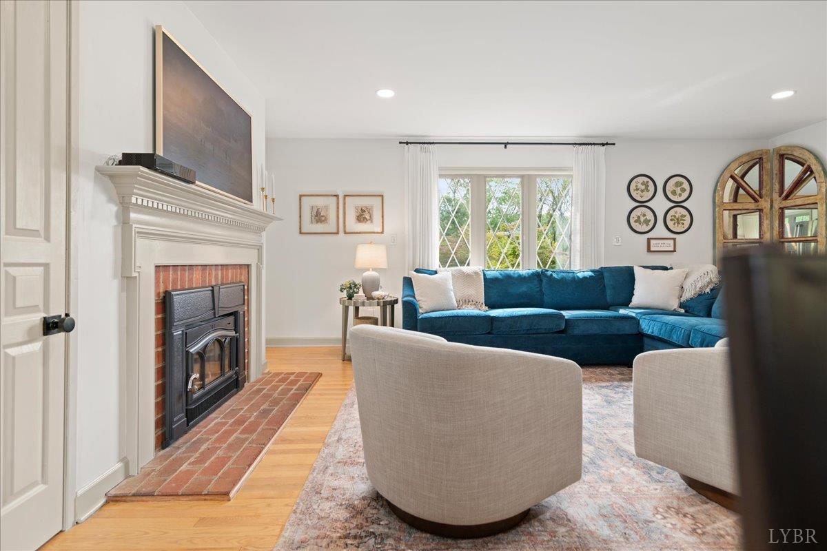 181 Mobley Mountain Road Amherst, VA 24521 - Photo 21 of 98 a living room with furniture and a fireplace