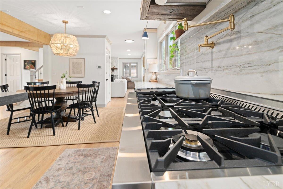 181 Mobley Mountain Road Amherst, VA 24521 - Photo 33 of 98 an open kitchen with dining table and chairs