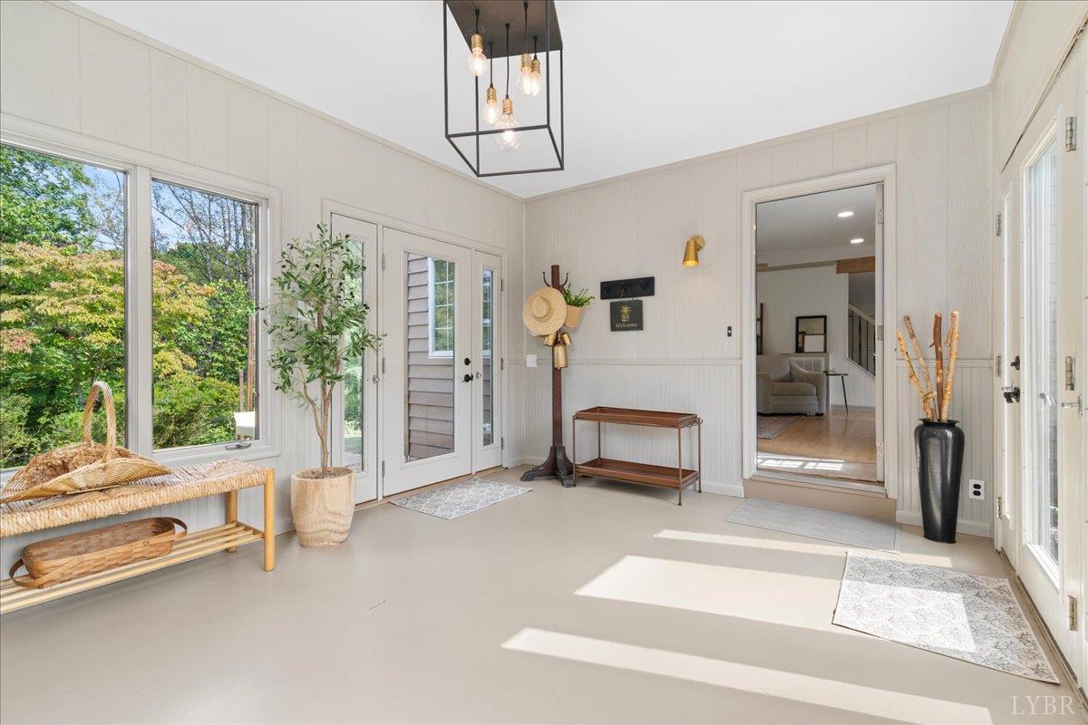 181 Mobley Mountain Road Amherst, VA 24521 - Photo 5 of 98 a living room with furniture and a fireplace